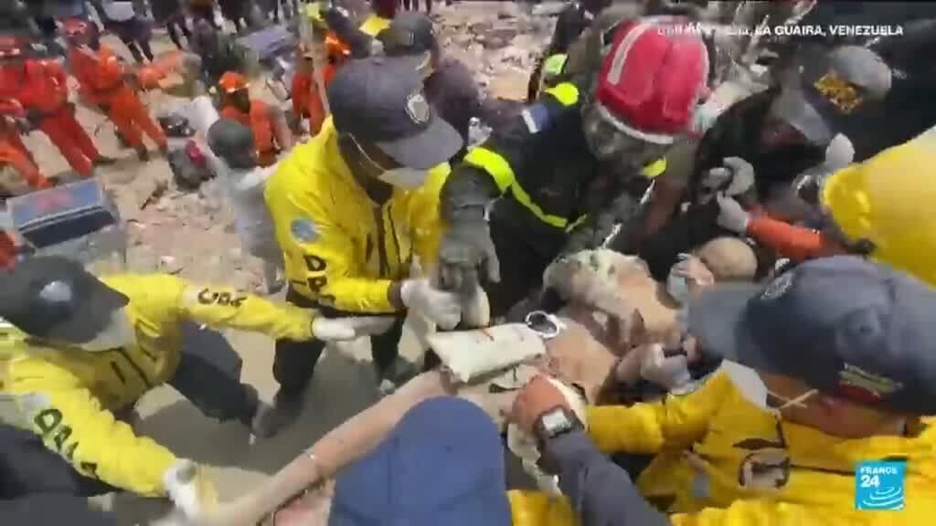 Venezuela earthquakes: Father and son rescued as international teams help search